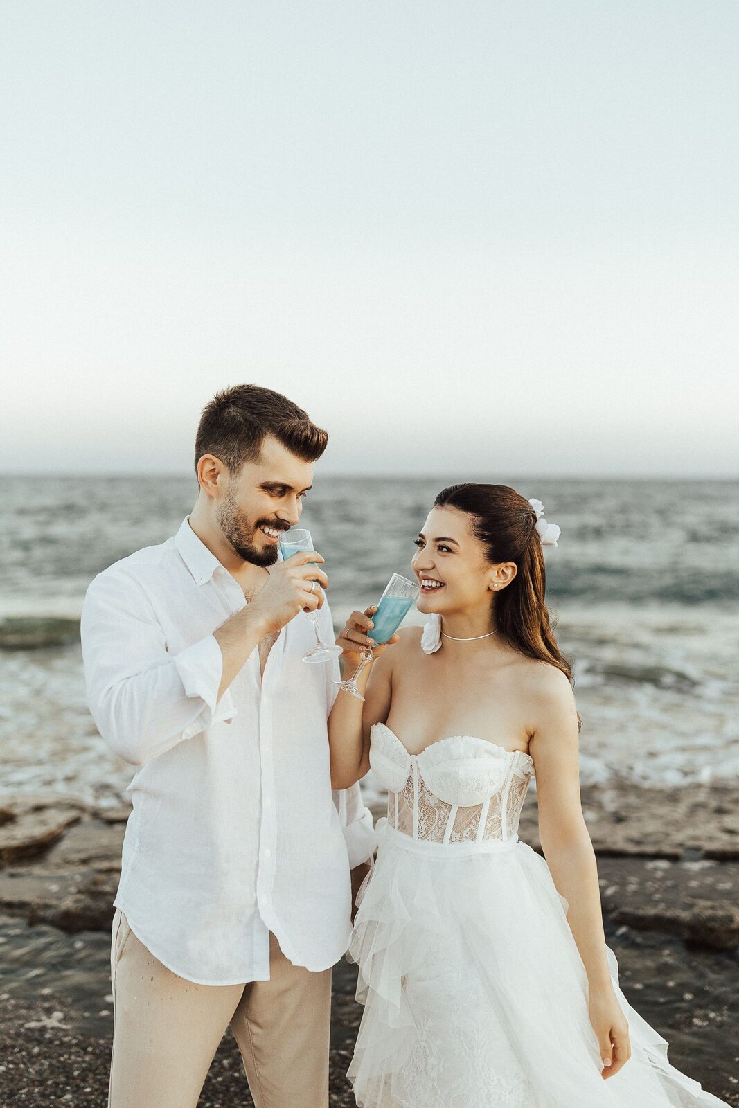 Sofia and Cameron together in the ocean breeze